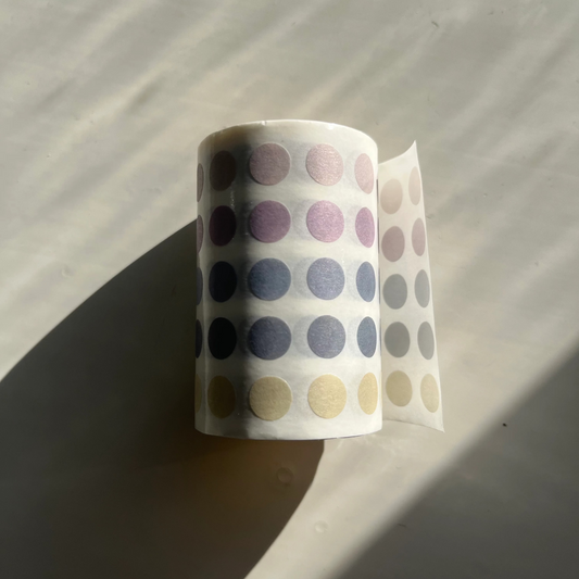 Rollo troquelado de pegatinas circulares de colores pastel